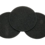 A group of three black discs sitting on top of each other.